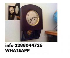 Orologio antico a pendolo da paretemuro in legno